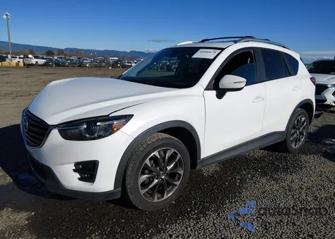 2016 Mazda Cx-5 Grand Touring z USA, uszkodzony, nr VIN JM3KE4DY0G0871015